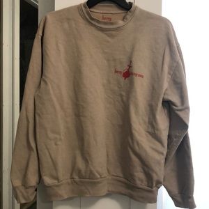 Kacey Musgraves tan crewneck